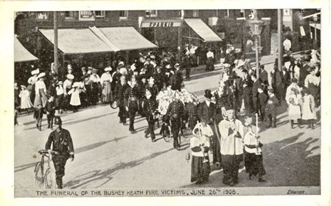 Post card by Downer of Watford showing fatal fire at Bushey Heath, Hertfordshire. The Funeral