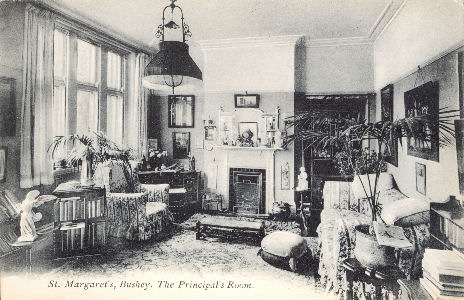 P A Buchanan post card of St Margaret's School, Bushey, Hertfordshire. The Principal's Room - interior with furniture, gas light, potted plant, etc