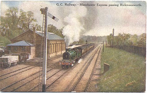 Title: G. C. Railway, Manchester express passing Rickmansworth - Publisher: Alpha Postcard No 1402, The Alphalsa Publishing Co Ltd, 2 & 4 Scrutton St, London, E C 2