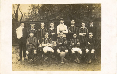 Watford area fooftball team, by Percy Landon